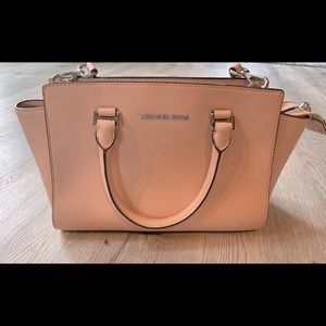 Nude pink Michael Kors handbag with removable cross body strap
